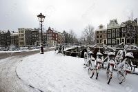 Amsterdam covered with snow  in winter in the Netherlands